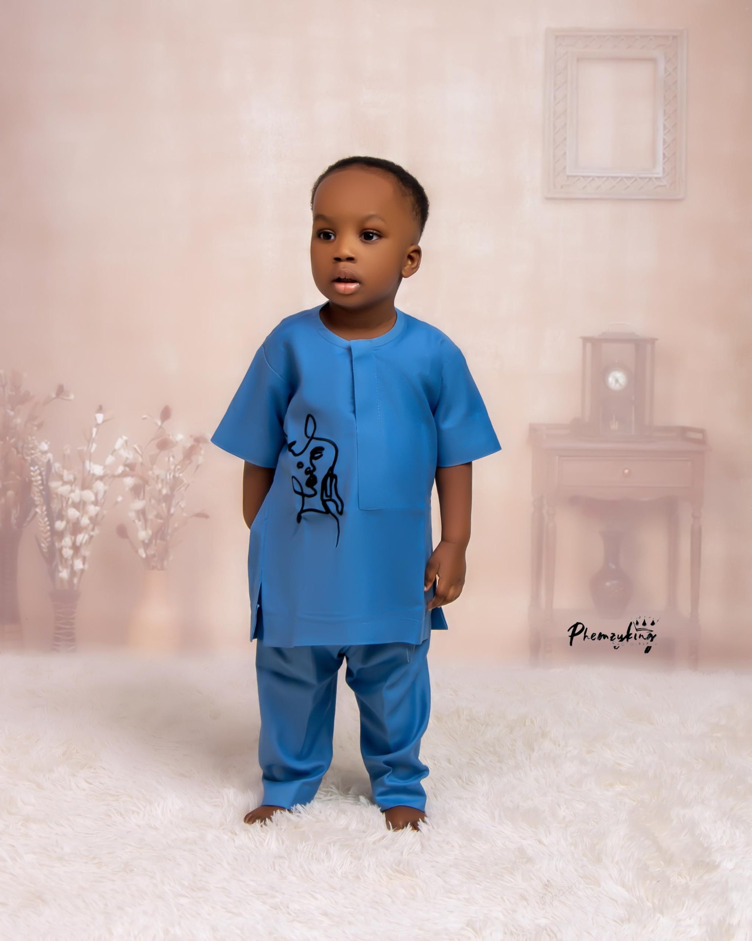 Toddler portrait in blue outfit